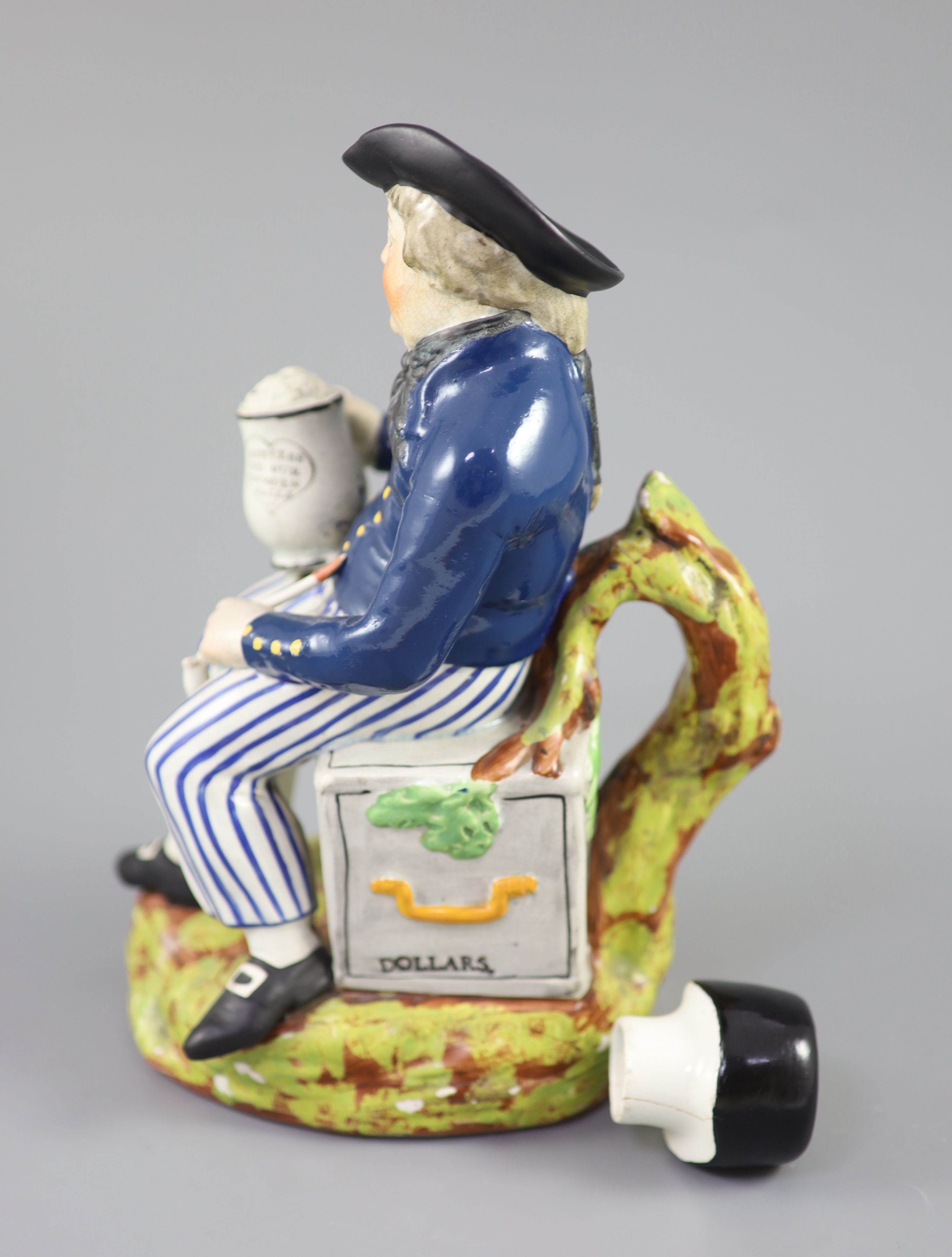 An American Pearlware sailor Toby jug with hat, Success to our Wooden Walls, c.1820, 27cm high